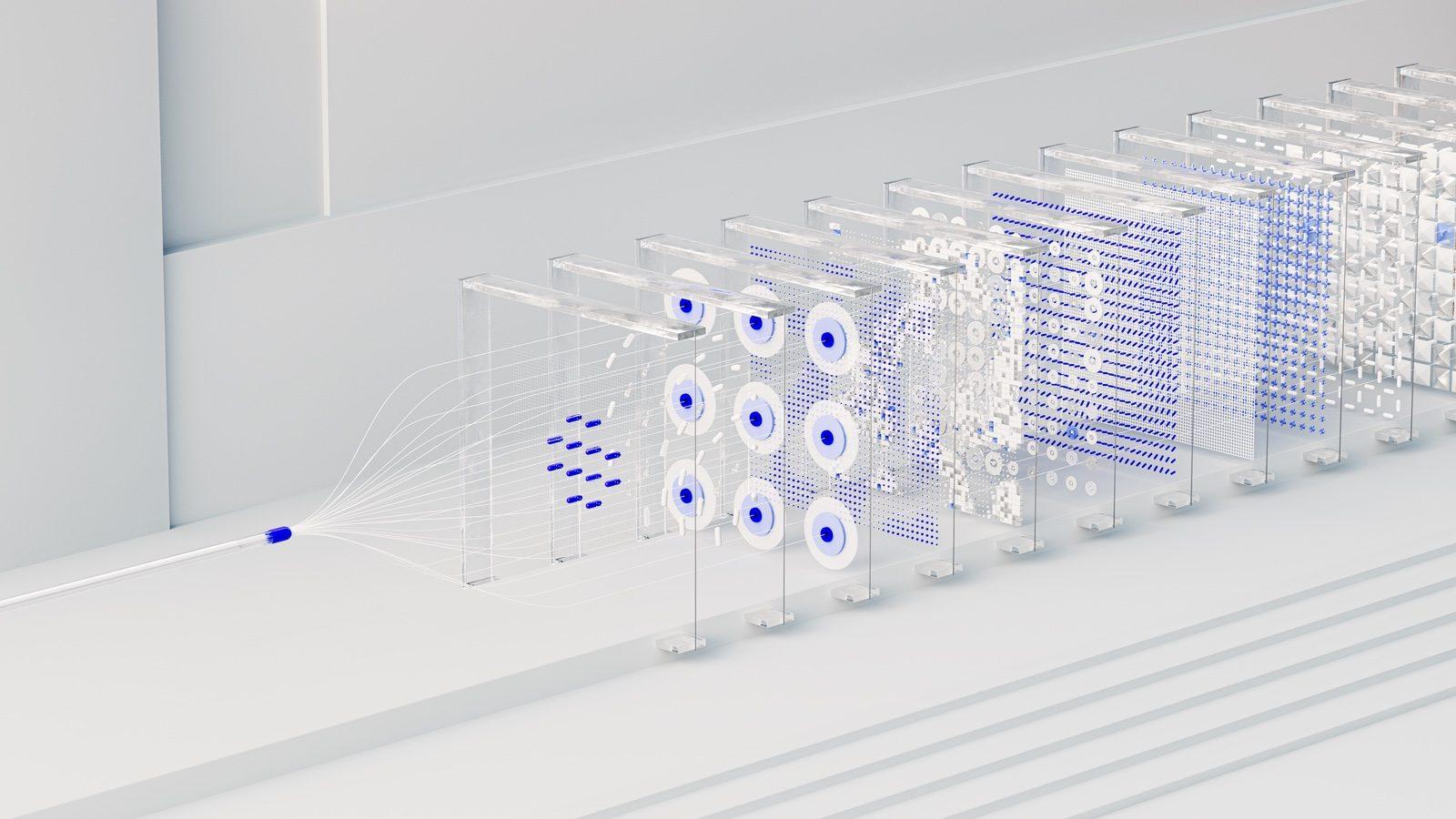 A team collaborating with analytics and AI tools on their screens in a bright modern office.